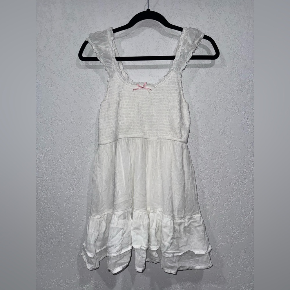 Babydoll White Ruffled Sundress with Pink Bow Accent